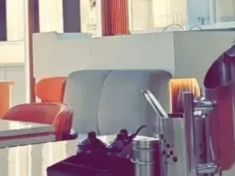 Orange leather and a grey sofa, Inside: counter and display