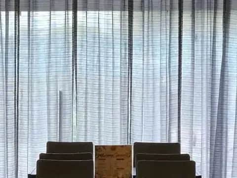 Full-width curtains, The curtained dining room