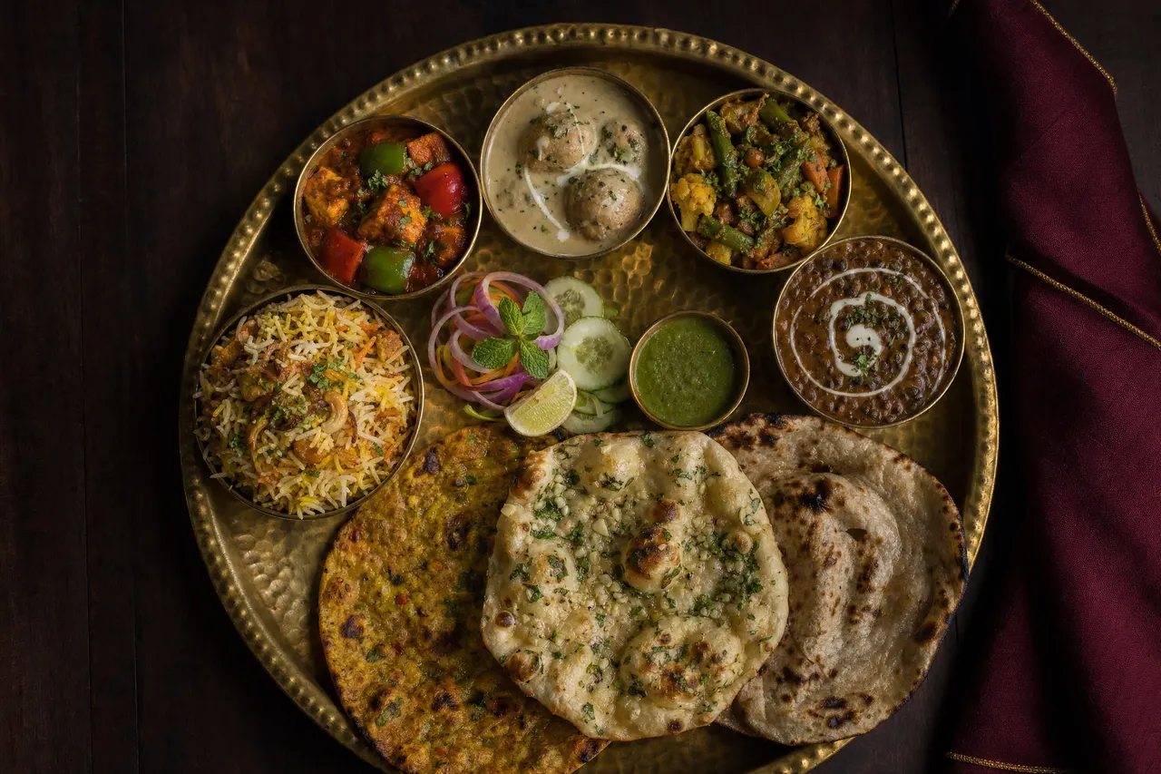 R.R. Special Thali: Kadhai paneer or paneer lababdar, malai kofta, mix veg, dal makhani, pulao or veg biryani, missi roti, garlic naan, tandoori roti.